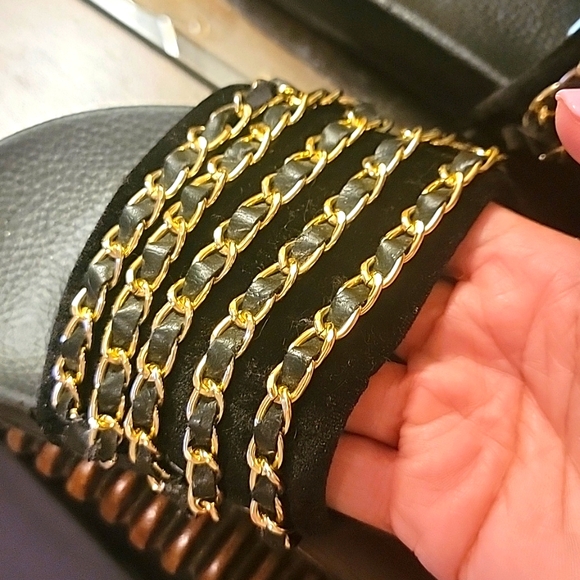 Black slides with gold chains across the top. Size 9 - Picture 5 of 7